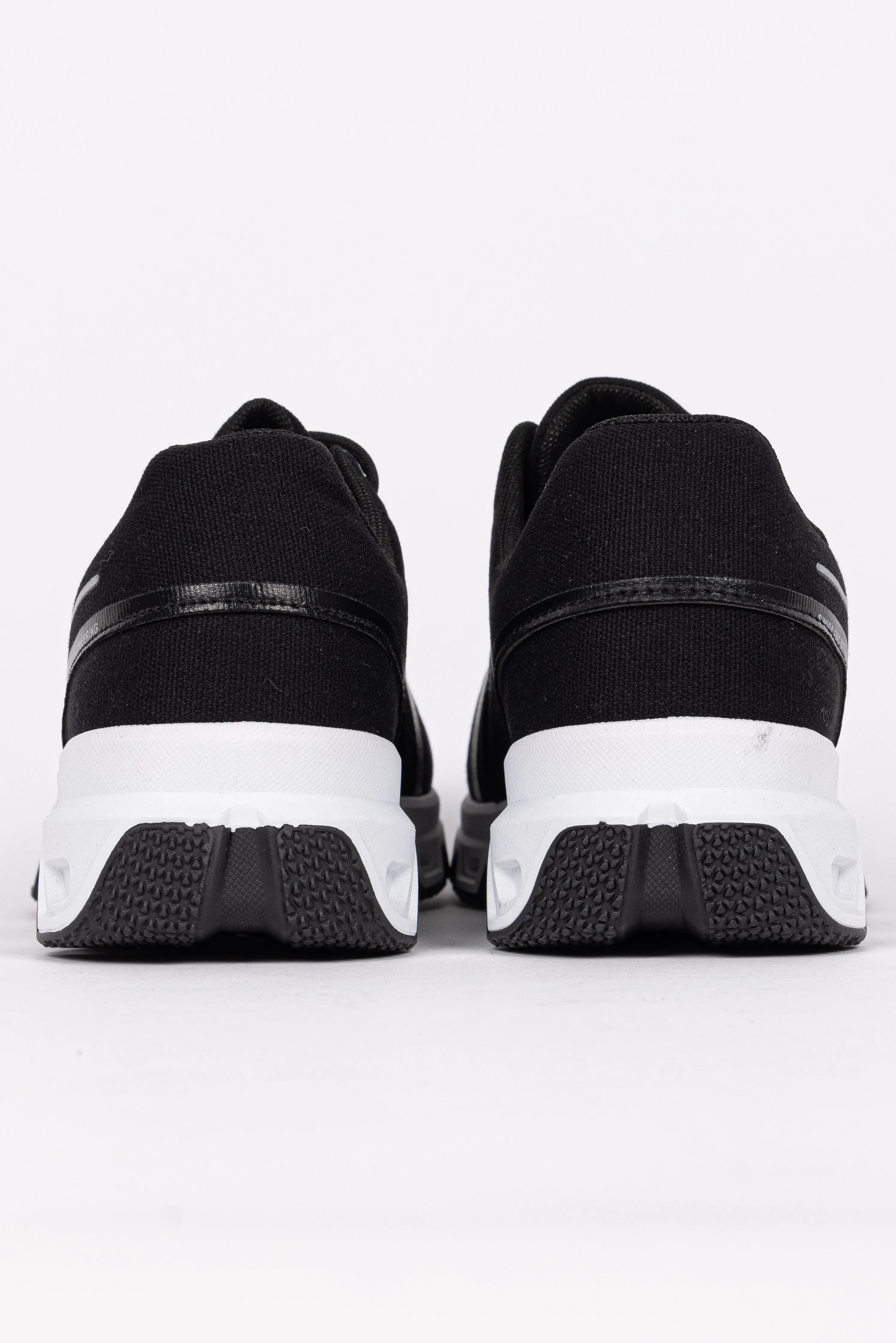 CONTRAST RUNNING TRAINERS